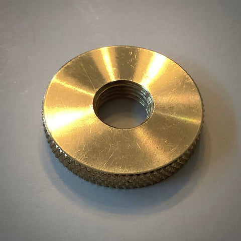 Solid unfinished brass 1 1/2 inch diameter with 1/4 ips threaded knurled lock nut commonly used for securing and distributing pressure over a larger area than typical nuts. Available at www.vintporium.com