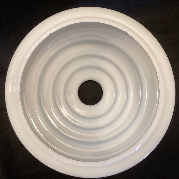 Interior view of concentric stepped glass shade illustrating layered construction.