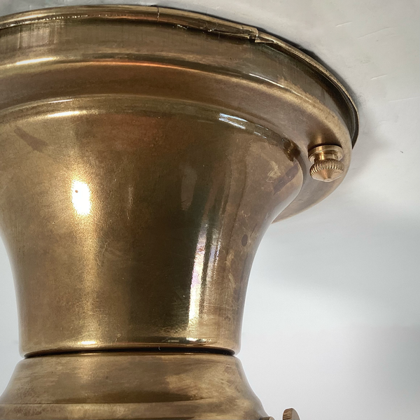 Vintage 1930s Empire Glass Ceiling Light – Floral Frosted Shade. 1930s with this charming flush mount ceiling light. Featuring a softly patinated brass canopy and a frosted glass shade adorned with embossed wildflowers and vertical fluting. Available at www.vintporium