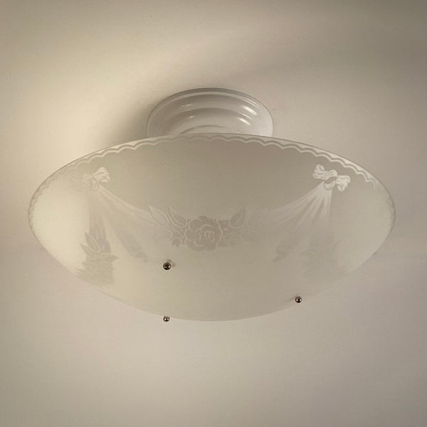 1950s postwar semi-flush ceiling light with frosted glass bowl and white enamel floral garland design, restored vintage ceiling fixture from Vintporium