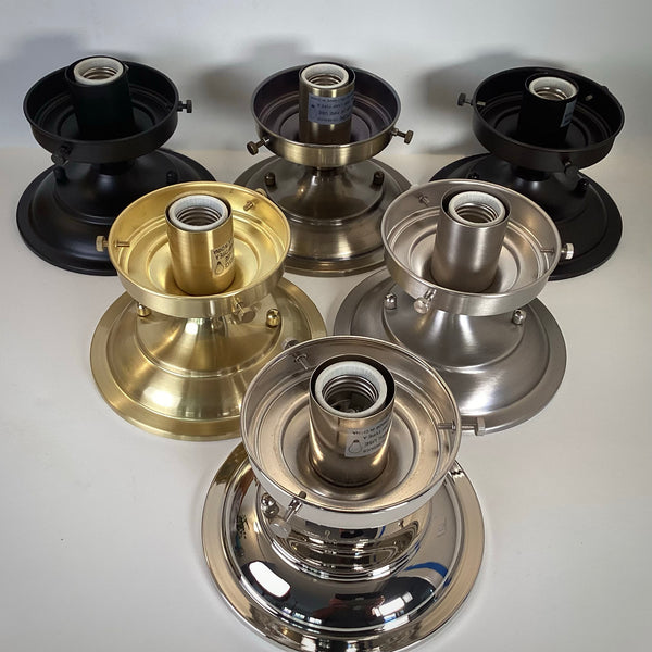 Top-down perspective of 4-inch fitter semi-flush light fixture shade holder hardware displaying socket interiors and metallic finishes.