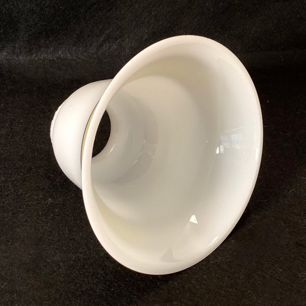 Inside bottom view looking through the opening of an opal white milk glass replacement light shade.