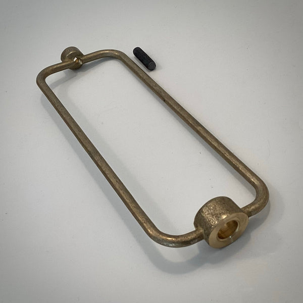 Bottom view of cast brass boudoir lamp harp showing mounting hole for 1/8-IP pipe