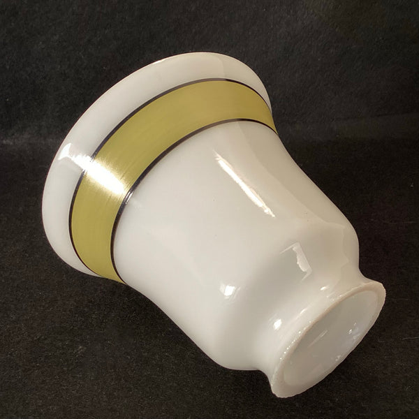 Side angle view showing the profile and mounting fitter lip of a Rejuvenation vintage-style glass light shade.
