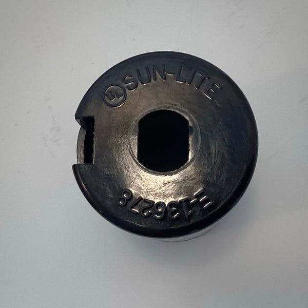 Close-up of the bottom cap on a black Sun-Lite light socket showing the molded UL safety listing mark and part number E-136278