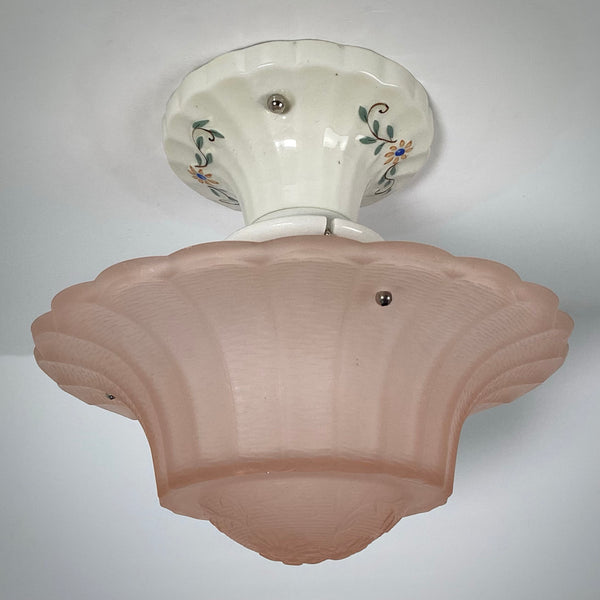 Vintage 1930s semi-flush light showing peach glass shade and porcelain fitter