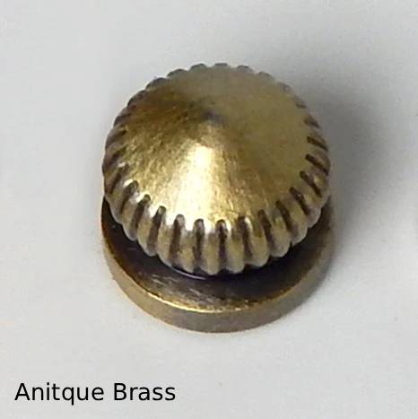 Decorative aged brass 8/32 female thread thumbnut for lighting fixtures, featuring a knurled edge and traditional antique finish.