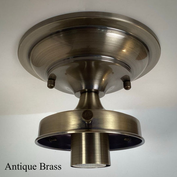 Antique brass 4-inch fitter semi-flush light fixture shade holder part with a vintage metallic finish.