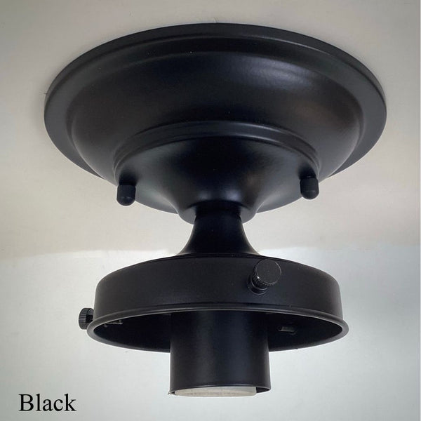 Matte black 4-inch fitter semi-flush light fixture shade holder part with socket for glass shade installation.