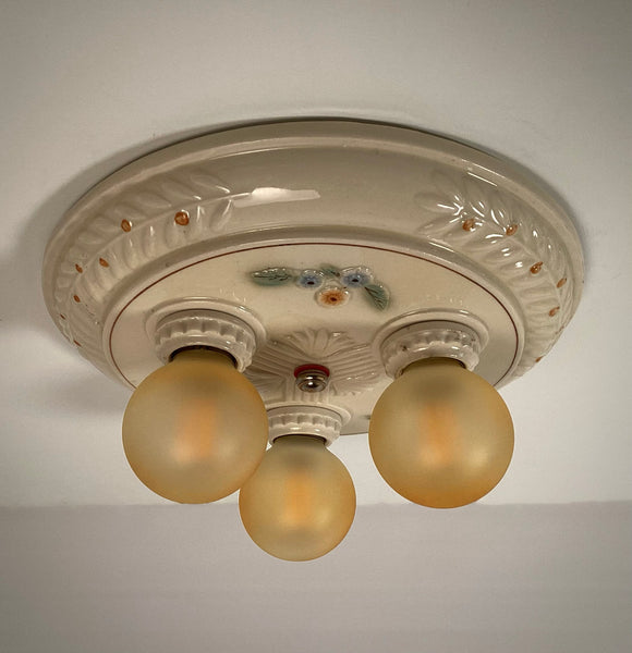 Antique Porcelain Flush Mount Pan Porcelain Ceiling Light Fixture. This beautiful antique porcelain ceiling light fixture features a classic 1930s design. The fixture has been restored and features new wiring, sockets, etc. It has been cleaned and detailed and is ready to install. Available at www.vintporium.com