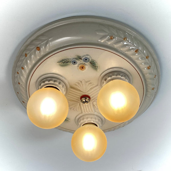 Antique Porcelain Flush Mount Pan Porcelain Ceiling Light Fixture. This beautiful antique porcelain ceiling light fixture features a classic 1930s design. The fixture has been restored and features new wiring, sockets, etc. It has been cleaned and detailed and is ready to install. Available at www.vintporium.com