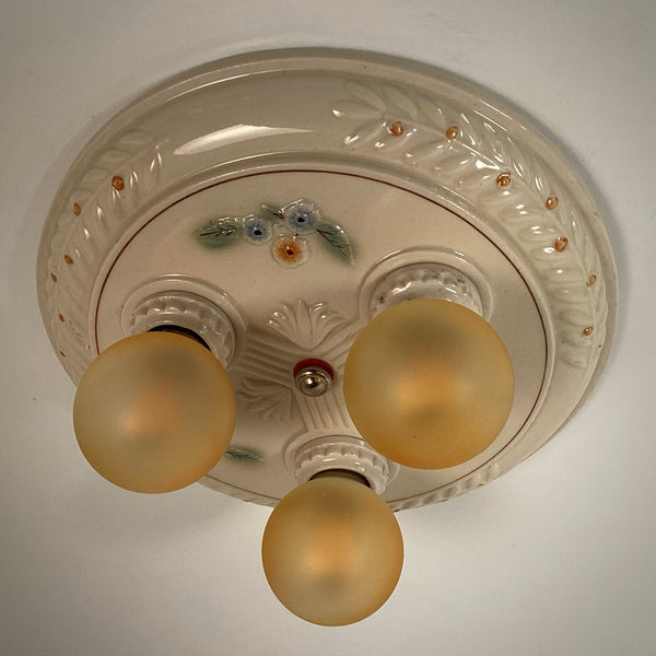 Antique Porcelain Flush Mount Pan Porcelain Ceiling Light Fixture. This beautiful antique porcelain ceiling light fixture features a classic 1930s design. The fixture has been restored and features new wiring, sockets, etc. It has been cleaned and detailed and is ready to install. Available at www.vintporium.com