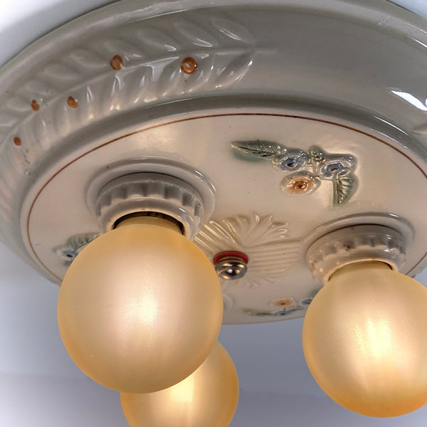 Antique Porcelain Flush Mount Pan Porcelain Ceiling Light Fixture. This beautiful antique porcelain ceiling light fixture features a classic 1930s design. The fixture has been restored and features new wiring, sockets, etc. It has been cleaned and detailed and is ready to install. Available at www.vintporium.com