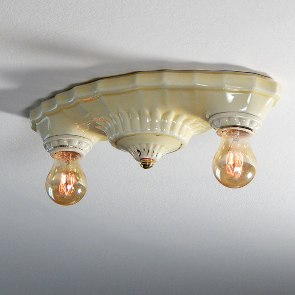 Vintage Flush Mount Uranium Glazed Ceiling Light Fixture  This beautiful antique ceiling light fixture is made of uranium glass glazed porcelain and features a classic Art Deco design. The fixture has been restored and features new wiring, sockets, etc. It has been cleaned and detailed and is ready to install. Available at www.vintporium.com