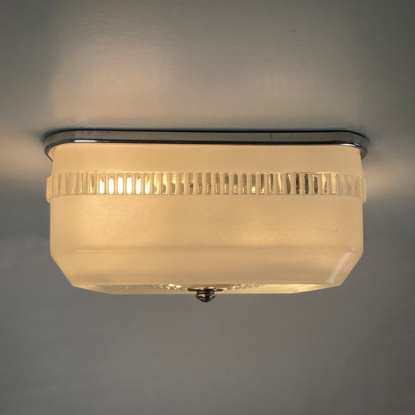 Vintage Flush Mount Square Ceiling Light Fixture.  The vintage light fixture has numerous new parts added to restore the piece. The fixture has been cleaned and detailed for your convenience. Available at www.vintporium.com