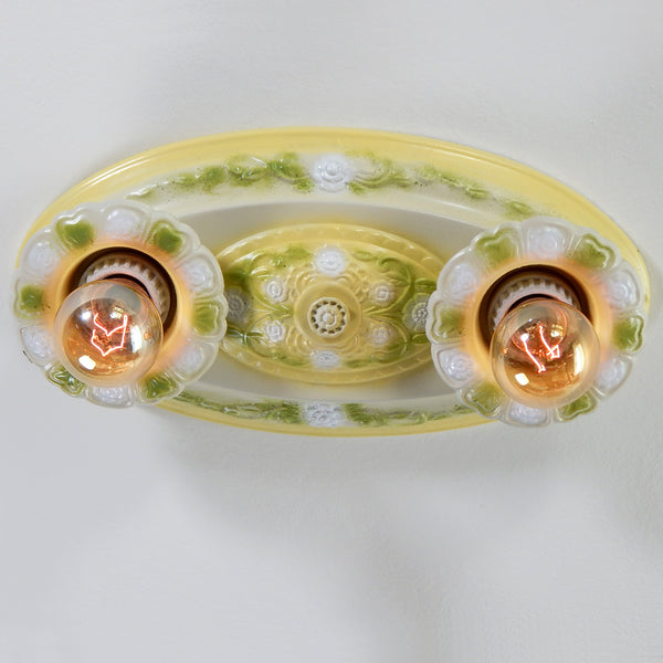 Antique Flush Mount Ceiling Pan Light Fixture. The renovated antique Edwardian flush mount ceiling light features new porcelain sockets, wire, wire sheathing, etc. The fixture has been cleaned and detailed and is ready for installation in your home. Available at www.vintporium.com