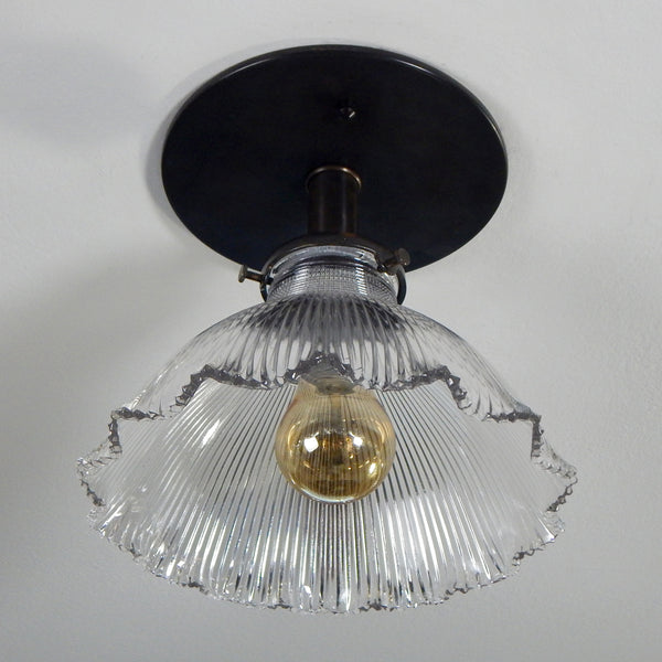 Contemporary Semi-Flush Holophane Ceiling Light Fixture. The fixture has new wiring, bronze-glazed porcelain sockets, etc. The fixture has been cleaned and detailed, including mounting hardware for easy installation. Available at www.vintporium.com
