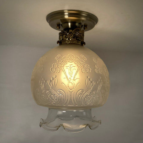 Vintage 1960s Art Nouveau Revival Semi-Flush Ceiling Light Fixture. The restored ceiling light features a new aged brass ceiling canopy with new wiring, a new socket, etc., while preserving its authentic 196s0s appeal. The fixture has been cleaned and detailed, and the hardware is included for a convenient installation. Available at www.vintporium.com