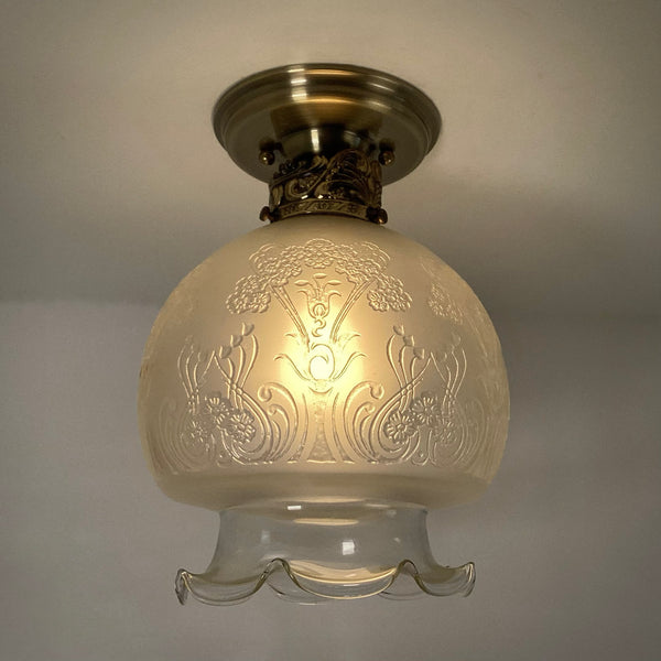 Vintage 1960s Art Nouveau Revival Semi-Flush Ceiling Light Fixture. The restored ceiling light features a new aged brass ceiling canopy with new wiring, a new socket, etc., while preserving its authentic 196s0s appeal. The fixture has been cleaned and detailed, and the hardware is included for a convenient installation. Available at www.vintporium.com