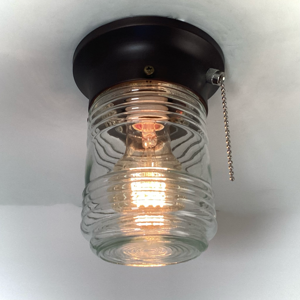 Flush Mount Ceiling Light Salvaged Jelly Jar Shade New Pull Chain Fixture. The flush mount ceiling light features a salvaged fresnel jelly jar-style glass shade and a new, UL-listed, pull-chain-equipped fixture base. Available at www.vintporium.com