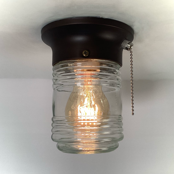 Flush Mount Ceiling Light Salvaged Jelly Jar Shade New Pull Chain Fixture. The flush mount ceiling light features a salvaged fresnel jelly jar-style glass shade and a new, UL-listed, pull-chain-equipped fixture base. Available at www.vintporium.com