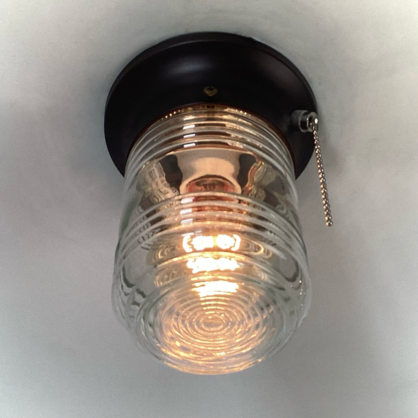 Flush Mount Ceiling Light Salvaged Jelly Jar Shade New Pull Chain Fixture. The flush mount ceiling light features a salvaged fresnel jelly jar-style glass shade and a new, UL-listed, pull-chain-equipped fixture base. Available at www.vintporium.com