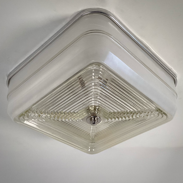 Vintage mid-century square ceiling light with aluminum fixture base and geometric stepped glass shade, unlit view — Vintporium