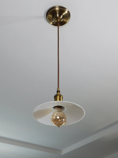 Cafe style pendant light fixture featuring vintage opal glass shade and new antique brass fixture. Available at www.vintporium