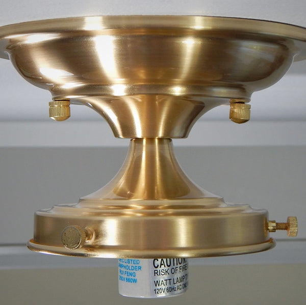 Bring new life to those old ceiling light fixtures by swapping out the old fixture bases for this Moderne 4 inch Schoolhouse Fixture. It will complement many glass shades with its crisp lines and complementary angles in your choice of antique brass, satin brass, black, bronze, polished nickel, and satin nickel finish.. Available at www.vintporium.com