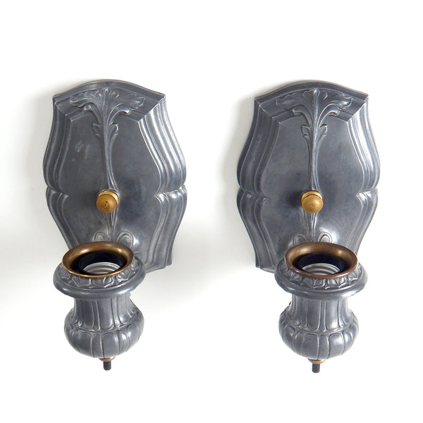 Antique Pair of Restored Ovalite Pot Metal Light Fixture Sconces with Rotary Switch Socket  This pair of 1924 Ovalite brand sconces are beautiful with their shining pewter-like finish and aged brass highlights. The sconces have been restored and feature new wiring and rotary switch sockets. The sconces have been cleaned, detailed, and are ready for installation. Available at www.vintporium.com