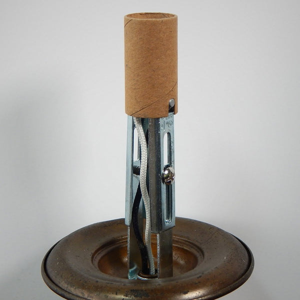 Finally an alternative to those plastic candelabra sockets. These high heat porcelain sockets are strong, durable and attractive. The sockets feature screw terminals, paper shell, and 1/8 ip threaded mount. They come in three sizes: 1 9/16 inch, 2 inches, and our adjustable 3 1/2 to 4 5/8 inch tall socket. Available at www.vintporium.com