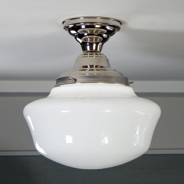 Semi-flush ceiling light featuring a vintage opal glass shade and a new polished nickel fixture. For your convenience, the piece has been cleaned, detailed, and is ready to install. Available at www.vintporium.com